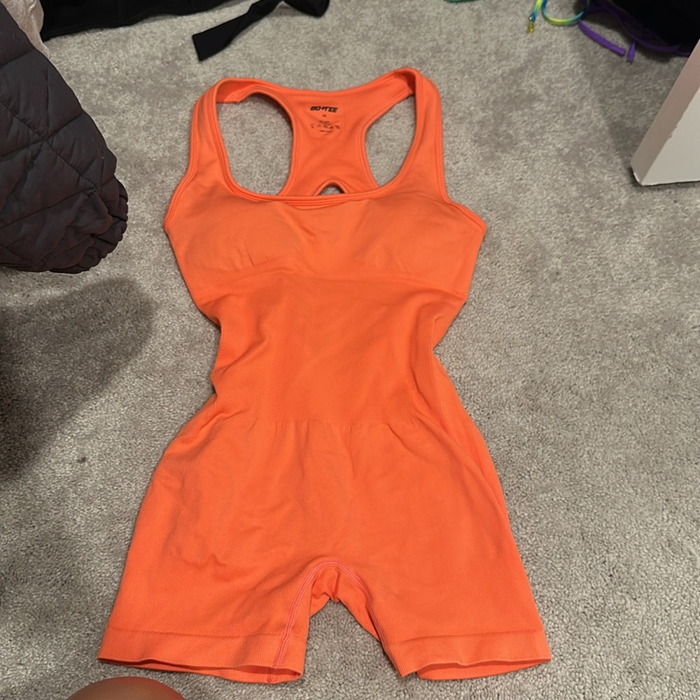 Bo + Tee medium unitard super sculpt open back in coral orange